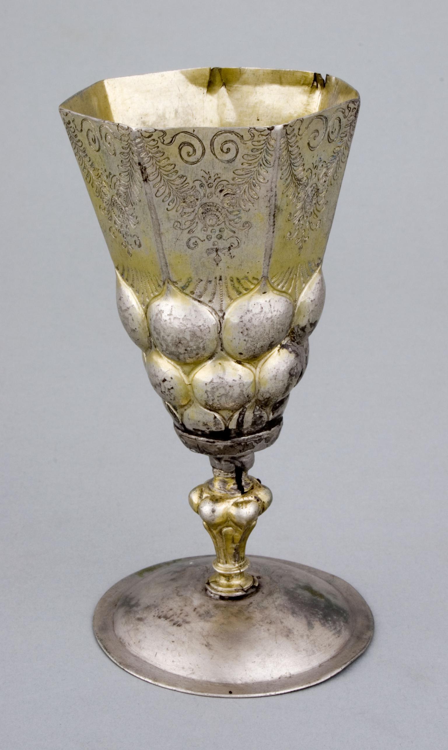 Cup engraved with floral motifs.