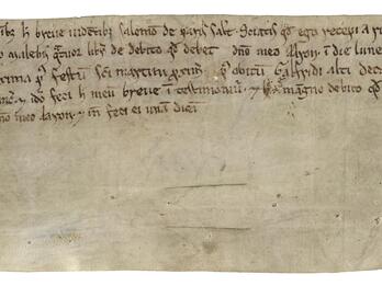 Parchment with five lines of Latin script toward the top and the rest blank.