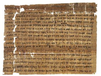 Fragmentary papyrus page of Hebrew writing.