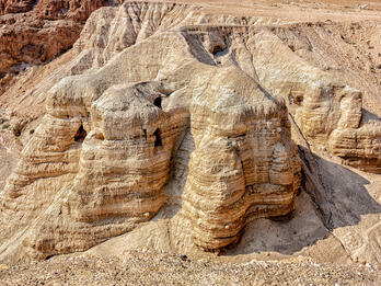 Aerial photograph of desert ridge with several openings.