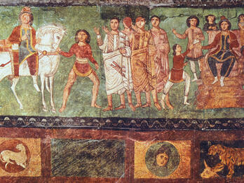 Ancient fresco showing a group of men and women in robes, some standing and gesturing, others seated on thrones. A man on horseback and a youth are on the left; decorative animal and portrait motifs run along the bottom.