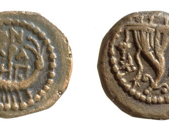 Two sides of an ancient coin: one side features a double cornucopia, and the other features a galley. Both sides have Greek inscriptions and dotted borders.