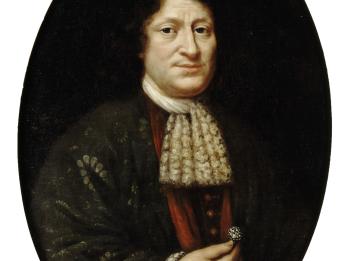 Portrait painting of man facing viewer in lace collar and holding a ring with right hand. 