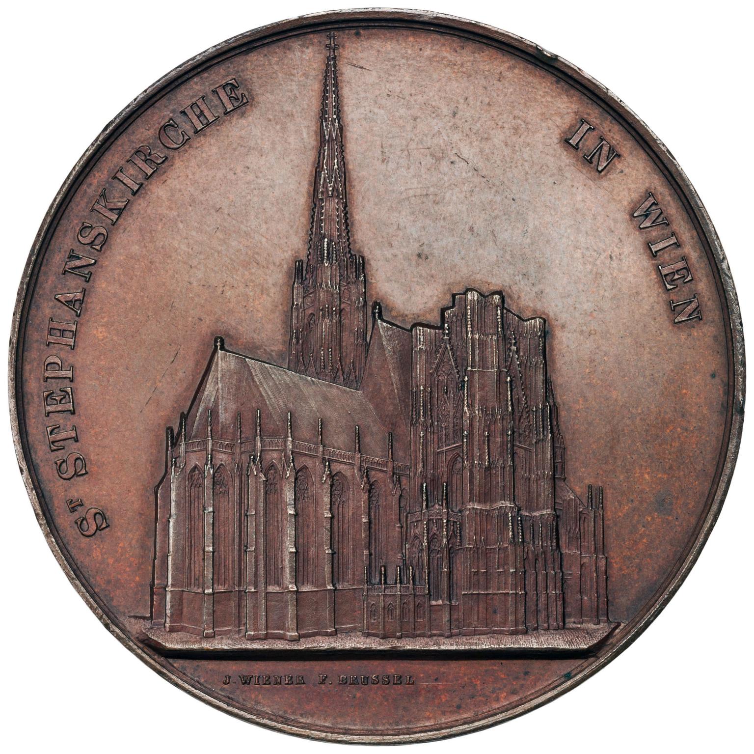 Medal with exterior of cathedral.