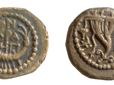 Two sides of an ancient coin: one side features a double cornucopia, and the other features a galley. Both sides have Greek inscriptions and dotted borders.