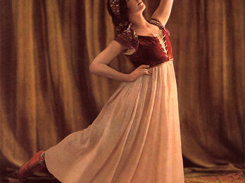 Photograph of dancer in dress.