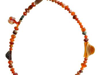 Glass and stone beaded necklace including three large triangular shaped pendants with stripes, and an irregular shaped pendant.