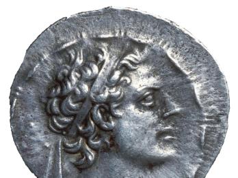 Coin with man's profile.