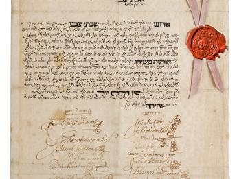 Manuscript page with Hebrew writing and Latin signatures underneath, with seal and ribbon on right side.