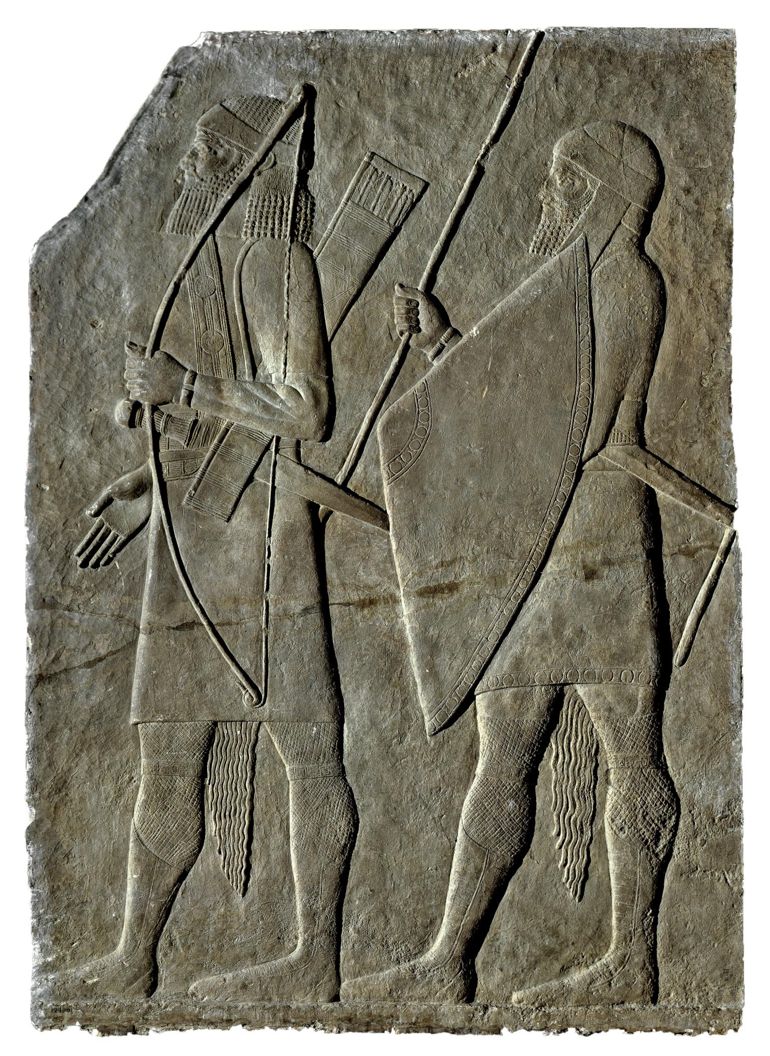 Relief with one archer holding bow and soldier with large triangular shield.