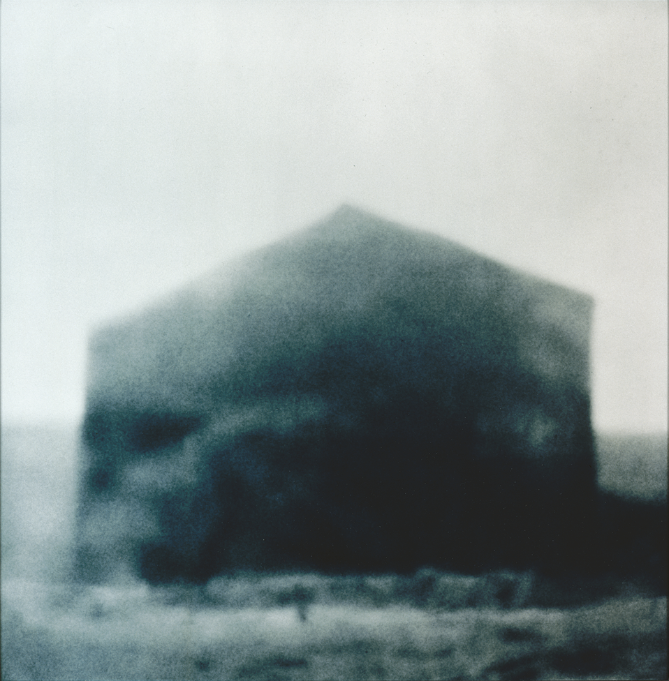 Chromogenic print depicting blurry building.