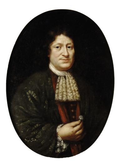 Portrait painting of man facing viewer in lace collar and holding a ring with right hand. 