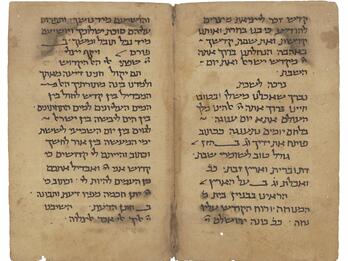 Facing manuscript pages in Hebrew script on lightly stained and damaged parchment.