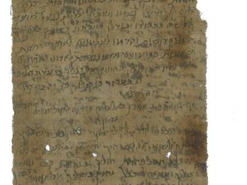 Worn and stained manuscript page with faded Hebrew script.
