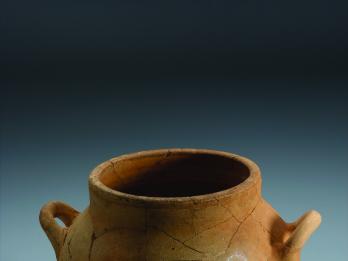 Ceramic pot with two handles and Hebrew inscription.