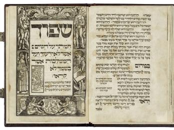 Facing-page of printed Hebrew text on right side and illustration on left side of Hebrew text surrounded by four full-length figures, decorative border, and two animal-human hybrids on the bottom of page on either side of shield with lion. 