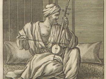 Print depicting man in turban and draped robe sitting amid pillows and playing instrument with bow.