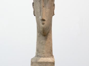 Sculpture of elongated head and neck.