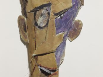 Mask with abstract facial features. 