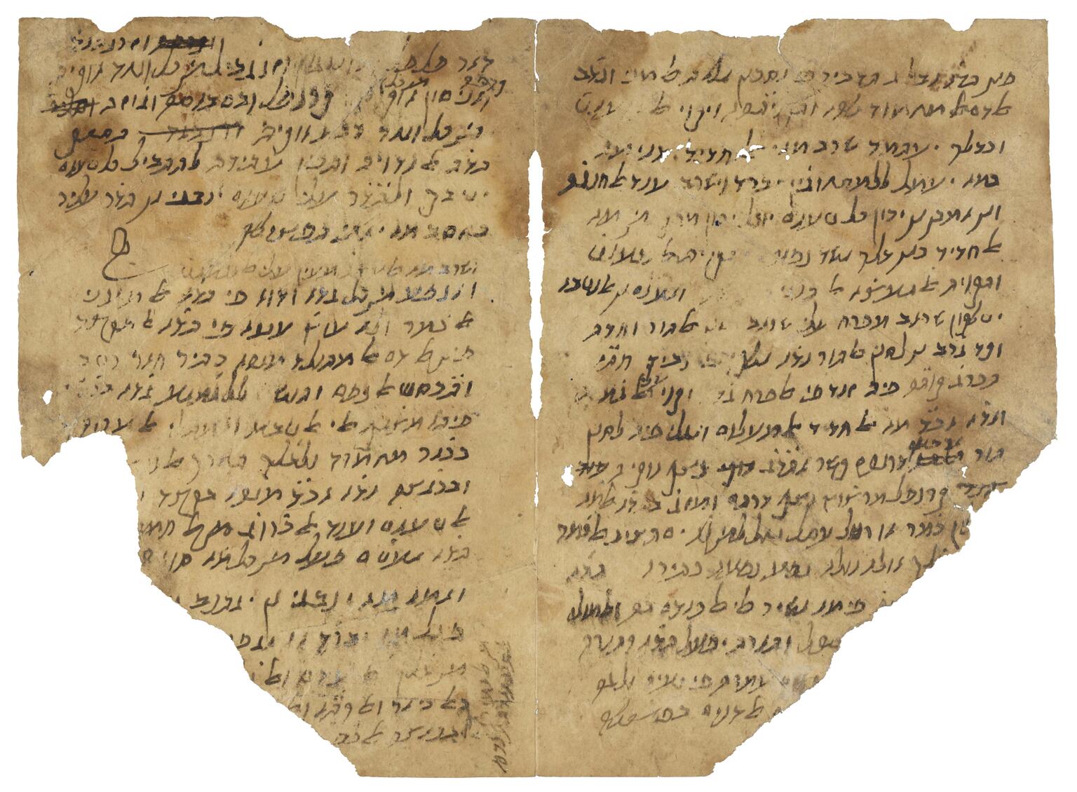 Damaged and torn parchment with Hebrew and Arabic writing in various sizes and orientations.