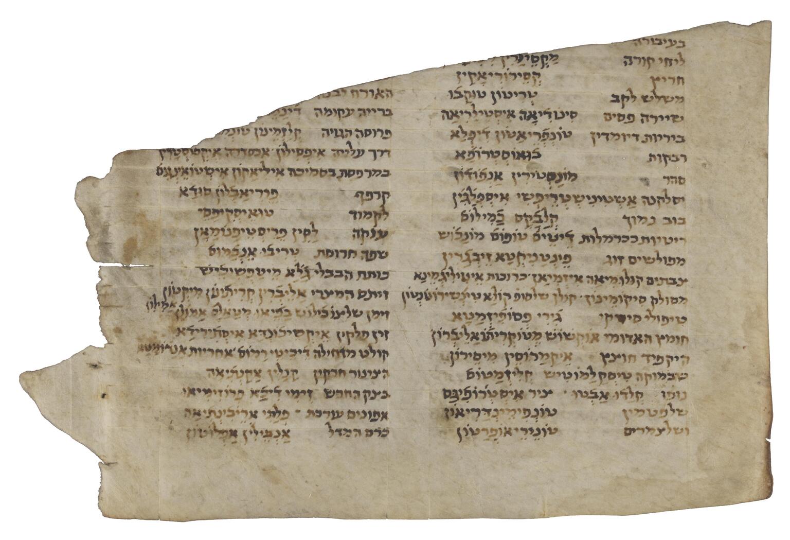A torn piece of parchment with handwritten Hebrew cut off at the top.