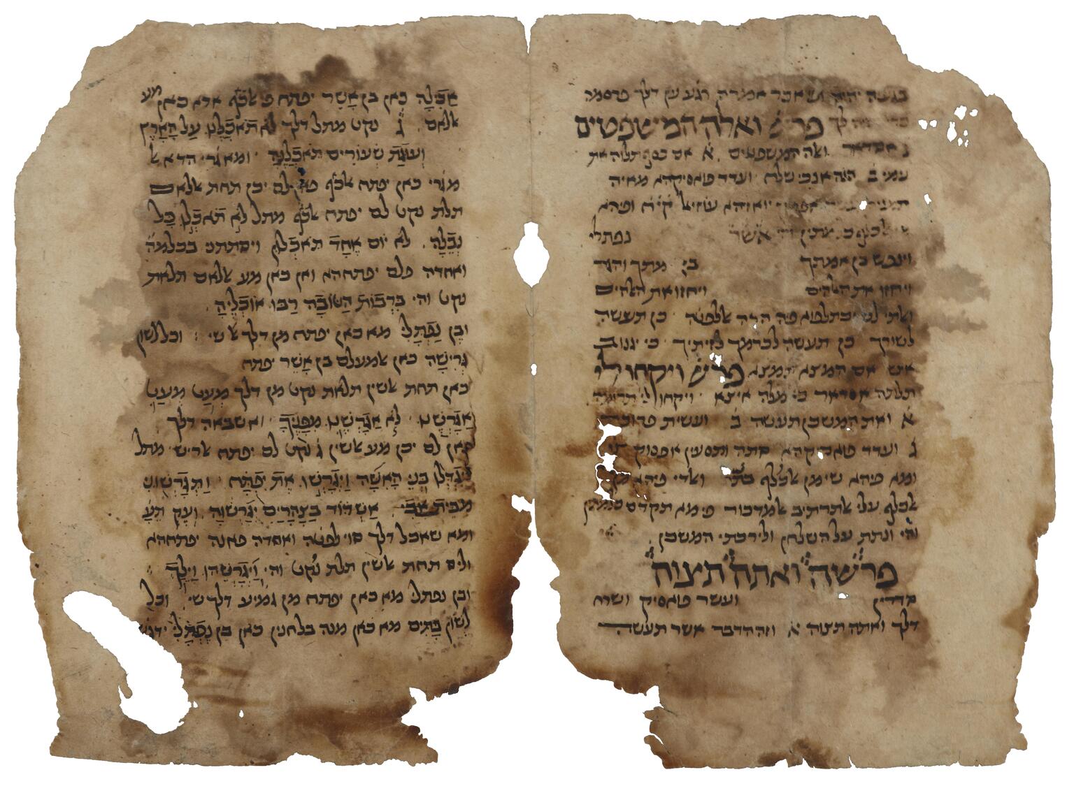 Facing, stained pages of handwritten Hebrew in two sizes, the smaller being vowelless.
