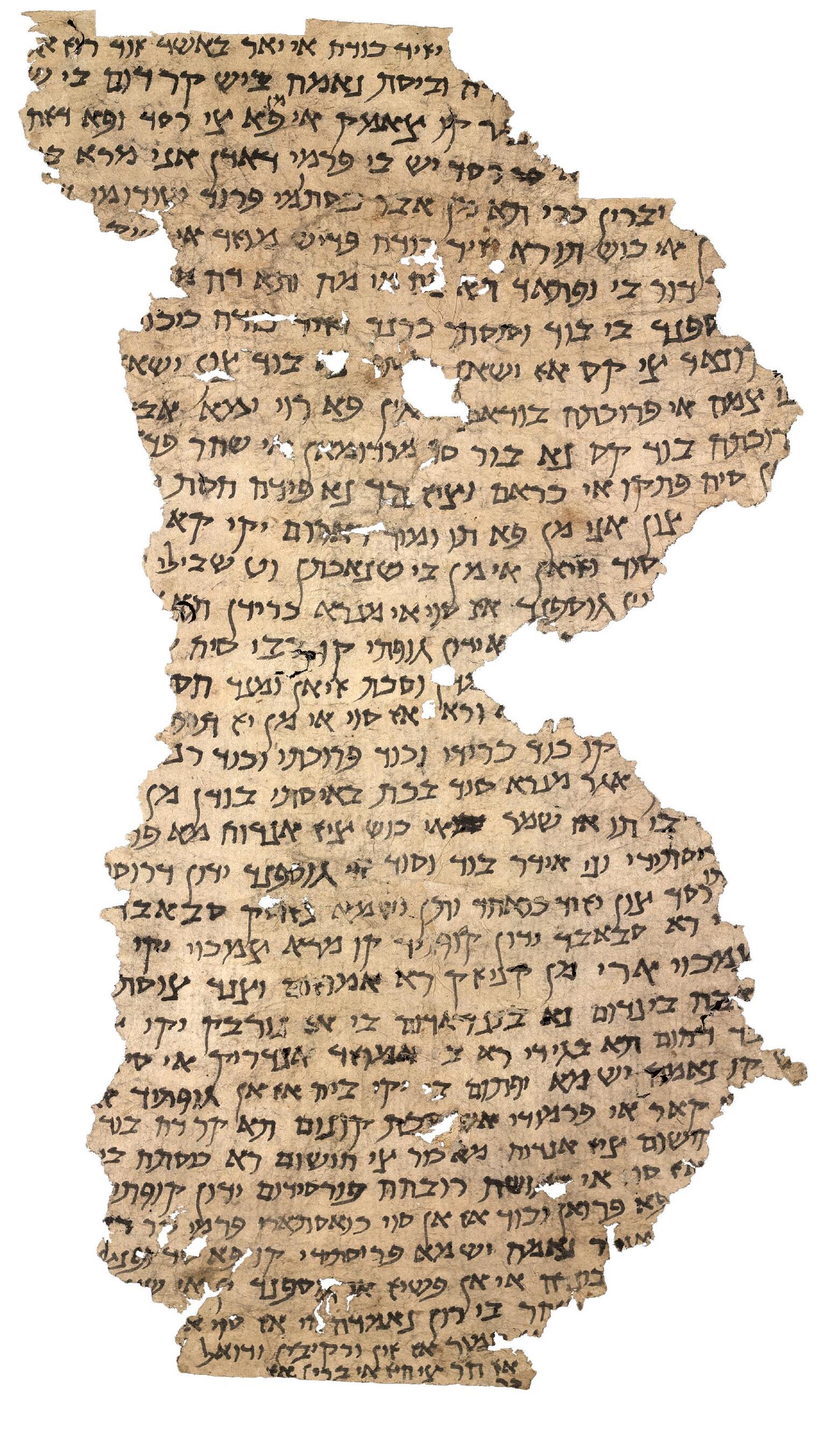 Irregular, torn fragment of parchment filled with vowelless Hebrew writing.