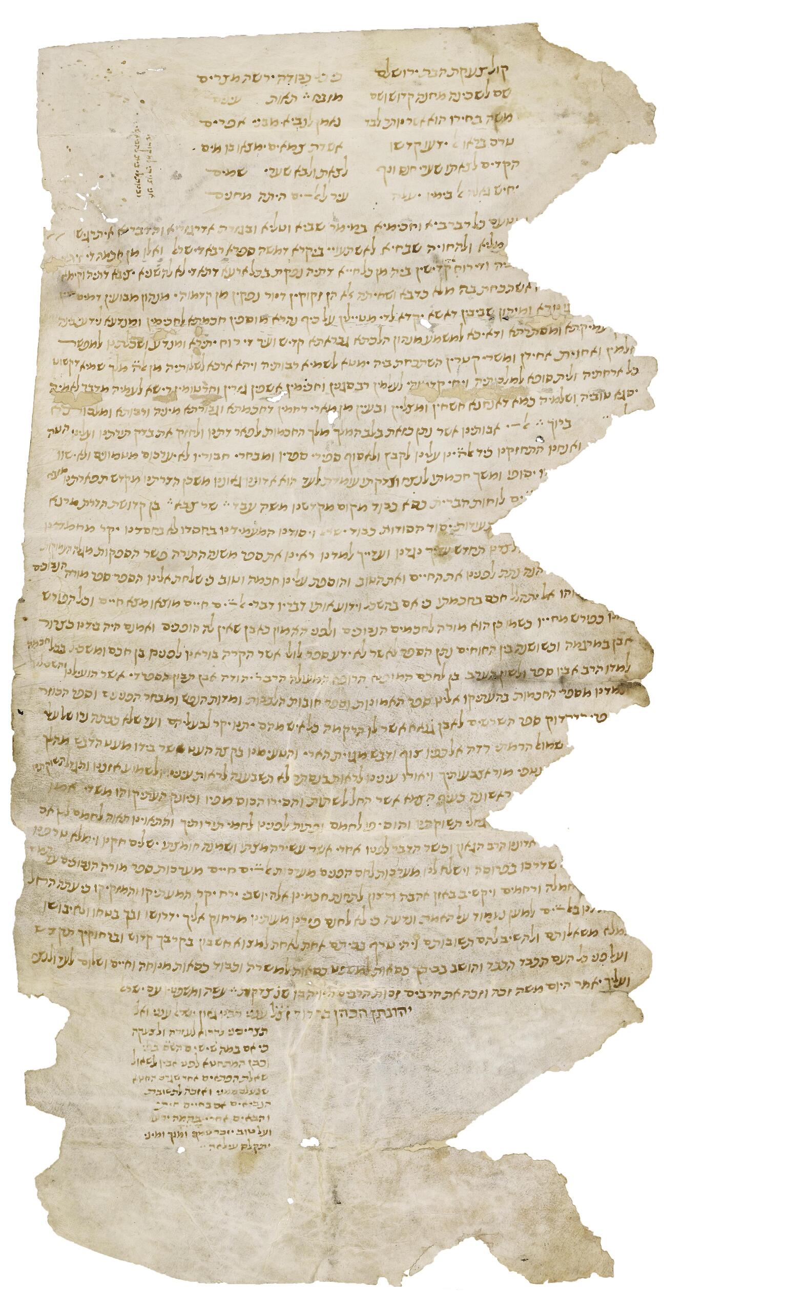 Damaged and torn parchment, especially in a zig-zag pattern on the right, with fading vowelless Hebrew script, largely as a long paragraph with two smaller columns above and one below.