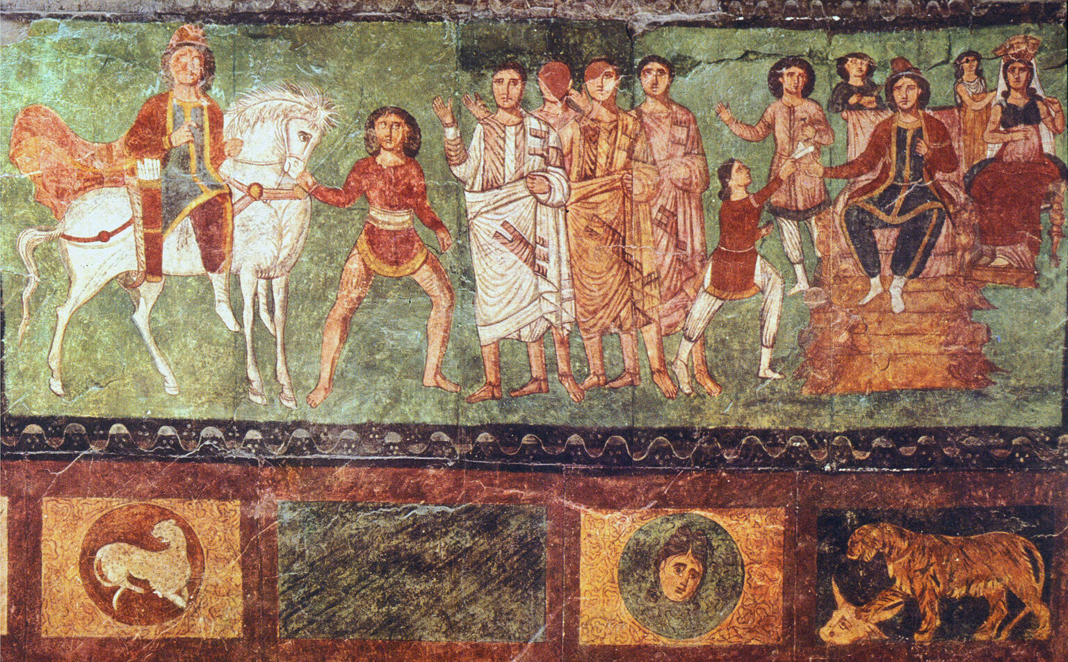 Ancient fresco showing a group of men and women in robes, some standing and gesturing, others seated on thrones. A man on horseback and a youth are on the left; decorative animal and portrait motifs run along the bottom.