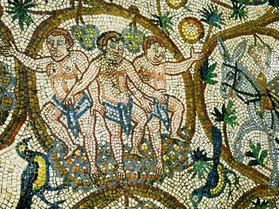Ancient mosaic depicting three men in loincloths surrounded by grape clusters and leaves, with intricate patterns and vibrant colors.