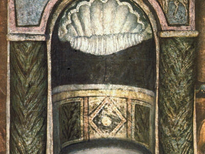 A fresco depicts a decorated arch with a scallop shell niche, flanked by ornate columns. Above, symbols include a menorah, a lulav and etrog, a structure with columns and doors, a figure with a knife, and a ram.