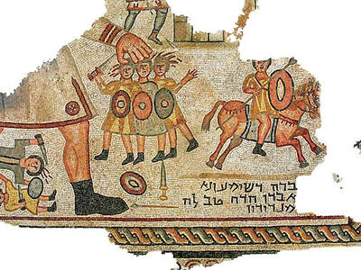 Ancient mosaic showing a large armored figure holding four small soldiers, with Aramaic text below, two fallen figures to the left, and a horse with a rider to the right. Some sections are missing or damaged.