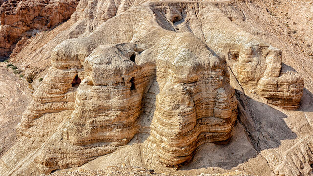 Aerial photograph of desert ridge with several openings.