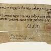 Fragment of parchment with four lines of vowelless Hebrew script, followed by the number 1250 and a red stamp and presentation credit in English, partly separated by a split across the paper.