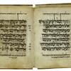 Book open to two facing pages containing large Hebrew writing, with a decorative blue and gold image to the left containing a few small Hebrew words, the final word in outline preceded by a small circular decoration, and smaller, vowelless notes in the margins.
