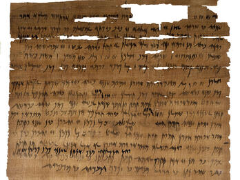 Papyrus page of Hebrew writing with some fragmentary sections.