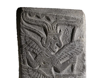 Hybrid Creatures with Six Wings Relief of figure with six wings and headdress.