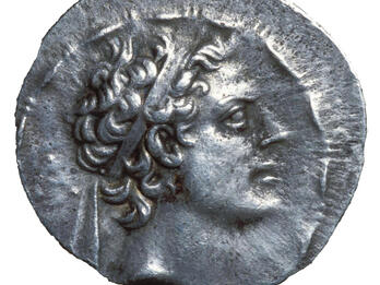 Coin with man's profile.