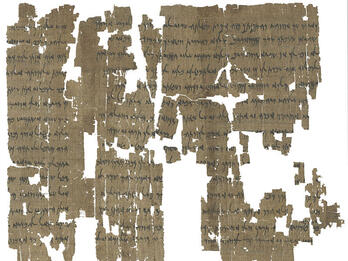 Fragmentary papyrus page of Aramaic writing. 