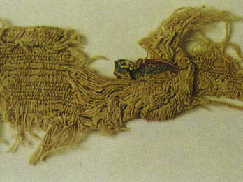 Woven linen fabric with two stripes in fragmentary state. 