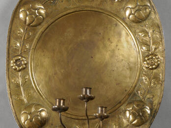 Candle Reflector Metal oval with three candlestick holders.