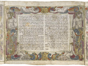 Scroll of the Book of Esther Manuscript scroll page with Hebrew text and decorated border with illustrations of cherubs, faces, animals, ribbons, and flowers.