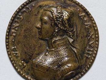 Medal of woman in profile with Hebrew and Latin text around perimeter.