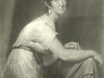Portrait of Fanny von Arnstein Painting of woman sitting sideways on a chair, with arms draped over the chair back and facing viewer, wearing short-sleeved dress, pearls, sash, and a curly updo.