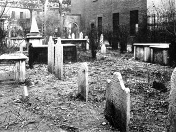 Oldest Jewish Cemetery in America Photograph of headstones in cemetery.