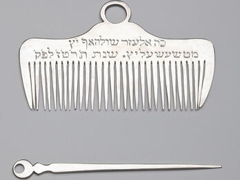 Burial Comb and Nail Pick of the Bischitz Burial Society Silver comb and nail pick.