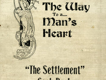 The Way to a Man’s Heart ("The Settlement" Cook Book) Printed page with English title and image of figure in robe playing flute instrument at the top left.