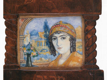 Framed painting of woman facing viewer, wearing beaded head covering, with domed building in background, and Hebrew word on frame underneath portrait.