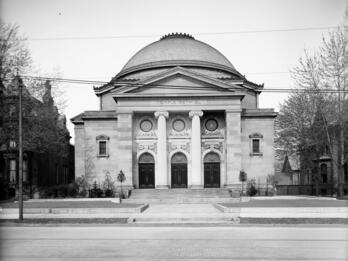 Photograph of exterior of building with domed roof.