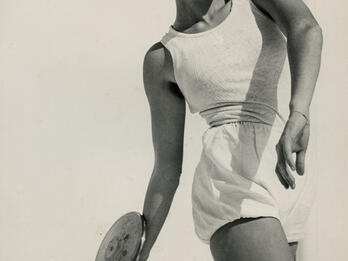 Sports in Israel: Discus Thrower Photograph of female athlete assuming position to throw a discus.